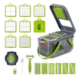 Cortador de verduras con accesorios completos, incluyendo pelador, cepillo de limpieza y diferentes cuchillas para cortes variados.