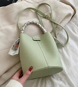 Summer fashion handbag solid color 2025 new style French small fresh shoulder crossbody bag trendy bucket bag