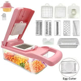Cortador de verduras 12 en 1 multifuncional y manual con cuchillas intercambiables. Incluye contenedor y accesorios para rallar, picar y cortar.
