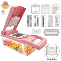 Cortador de verduras 12 en 1 multifuncional y manual con cuchillas intercambiables. Incluye contenedor y accesorios para rallar, picar y cortar.
